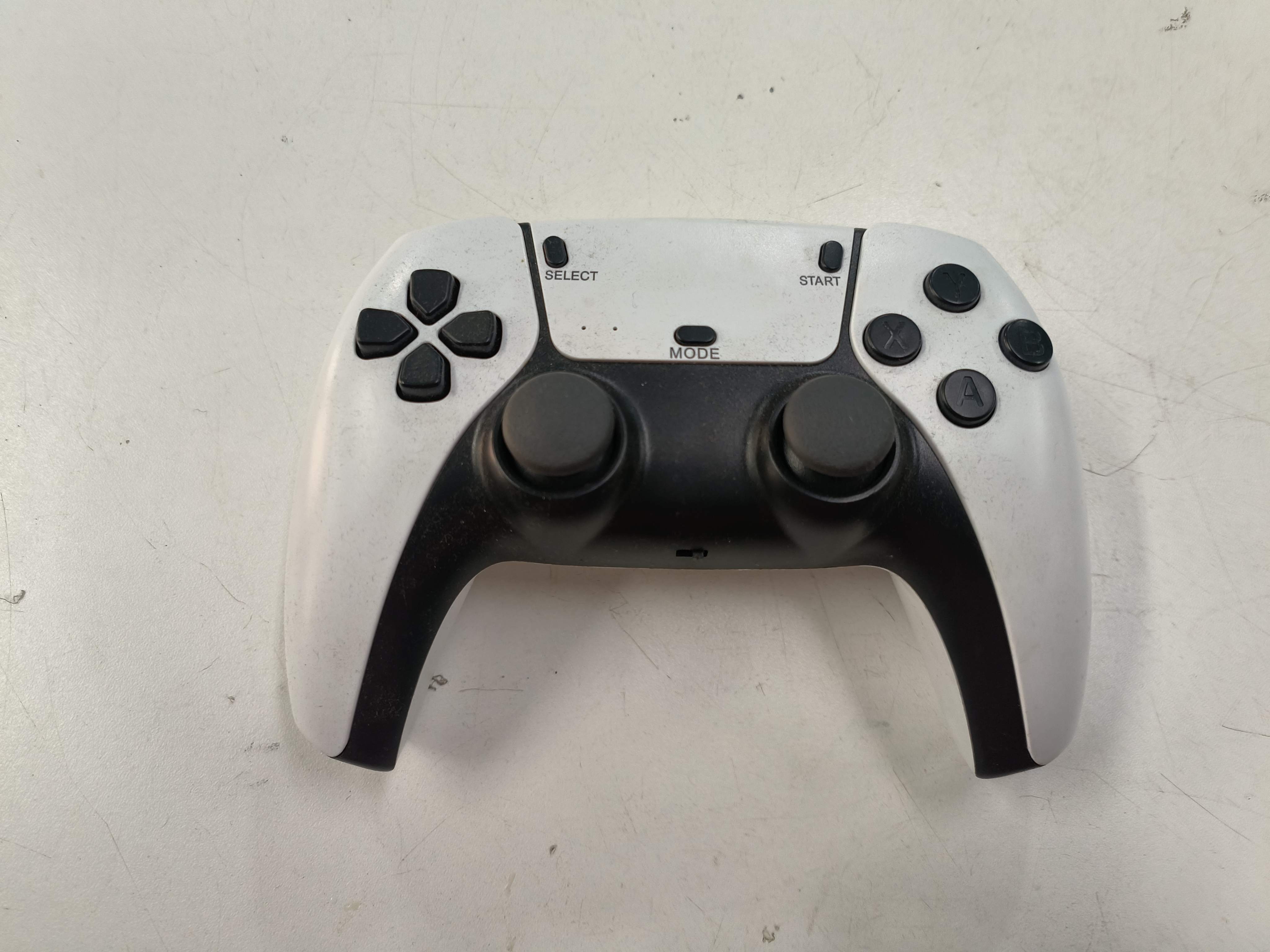 Wireless controller for the M15 Retro Game Stick console.